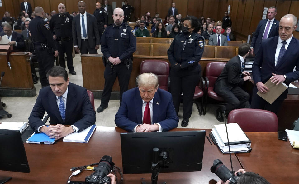 FILE - Former President Donald Trump, with lawyer Todd Blanche, left, attends trial in New York City, April 23, 2024. Trump's New York criminal trial is full of terms you don't typically hear in a courtroom. Centering on allegations Trump falsified his company's records to conceal the nature of hush money reimbursements, it's the first ever criminal trial of a former president and the first of Trump's four indictments to go to trial. (Timothy A. Clary/Pool via AP, File)