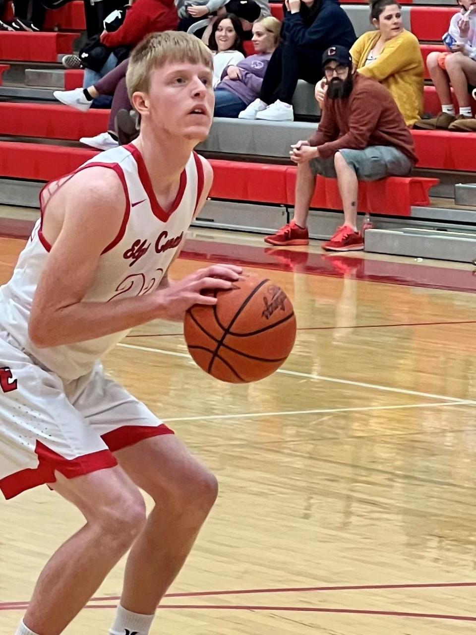 Elgin's Isaac Dillon shoots a free throw during Friday night's Northwest Central Conference boys basketball game with Upper Scioto Valley at home.