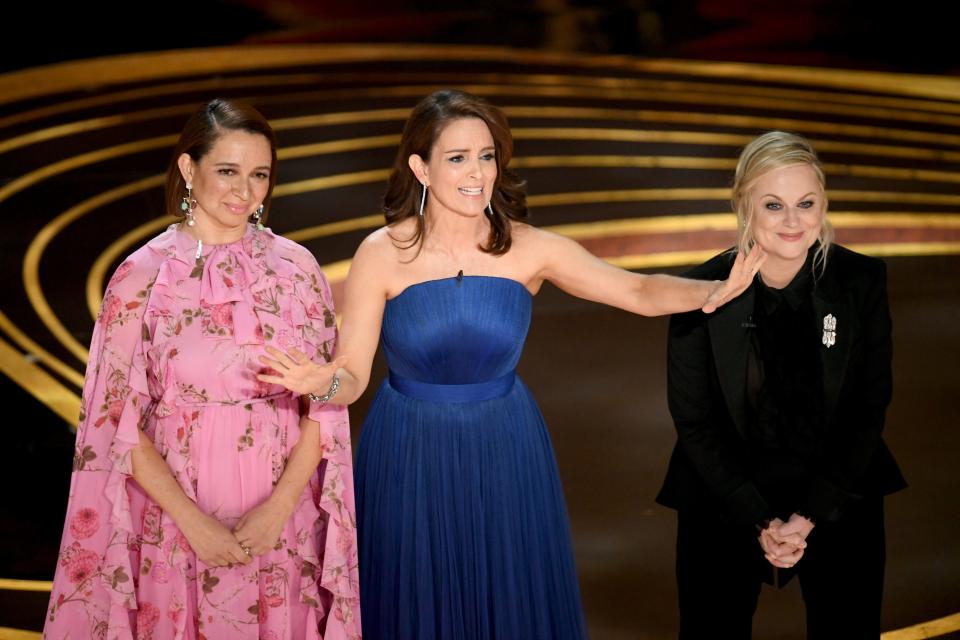 Maya Rudolph, Tina Fey, and Amy Poehler speak during the 91st Annual Academy Awards