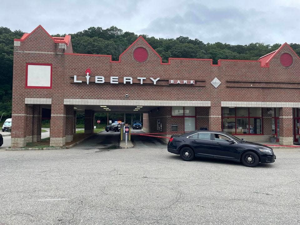 Norwich Police responding to the Liberty Bank on Salem Turnpike after a robbery Tuesday. The nearby CorePlus Credit Union was also robbed.