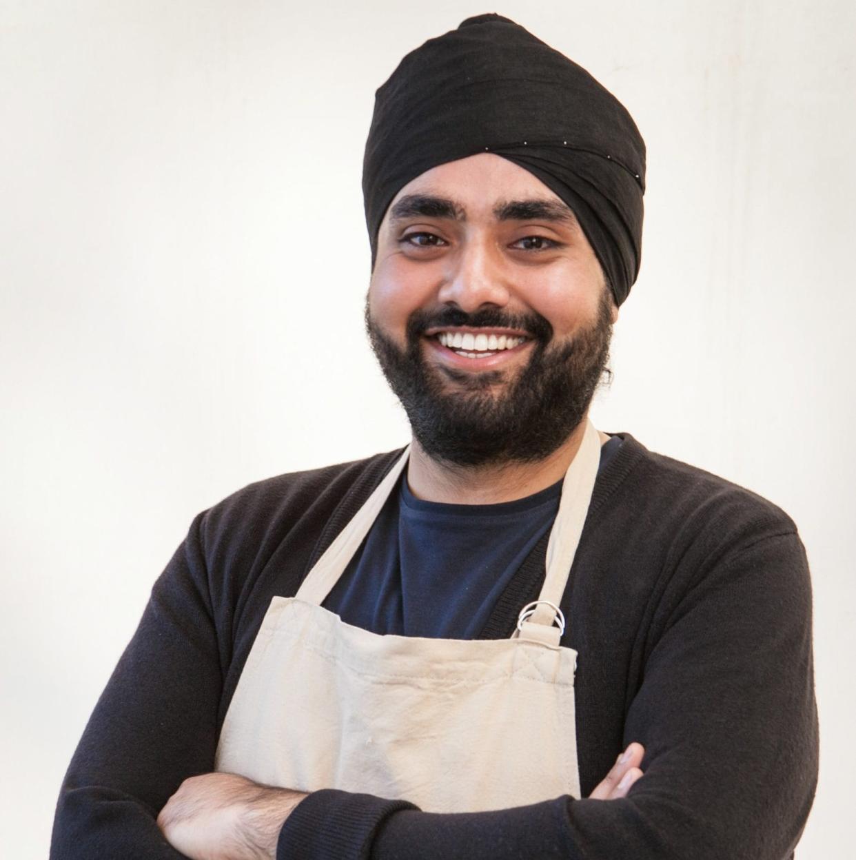 Rav Bansal in a baking apron