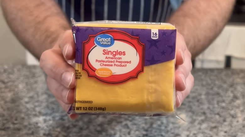Holding Great Value American Cheese