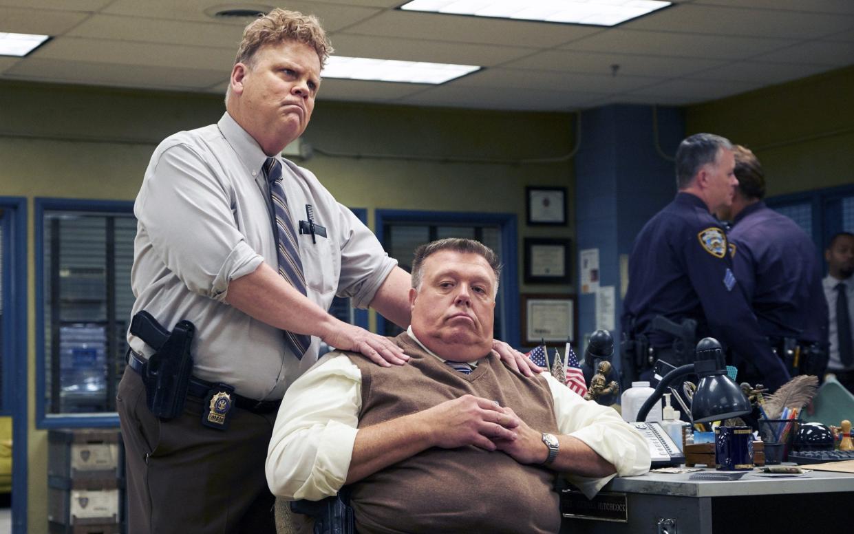 Dirk Blocker as Michael Hitchcock and Joel McKinnon Miller as Norm Scully  - NBCUniversal