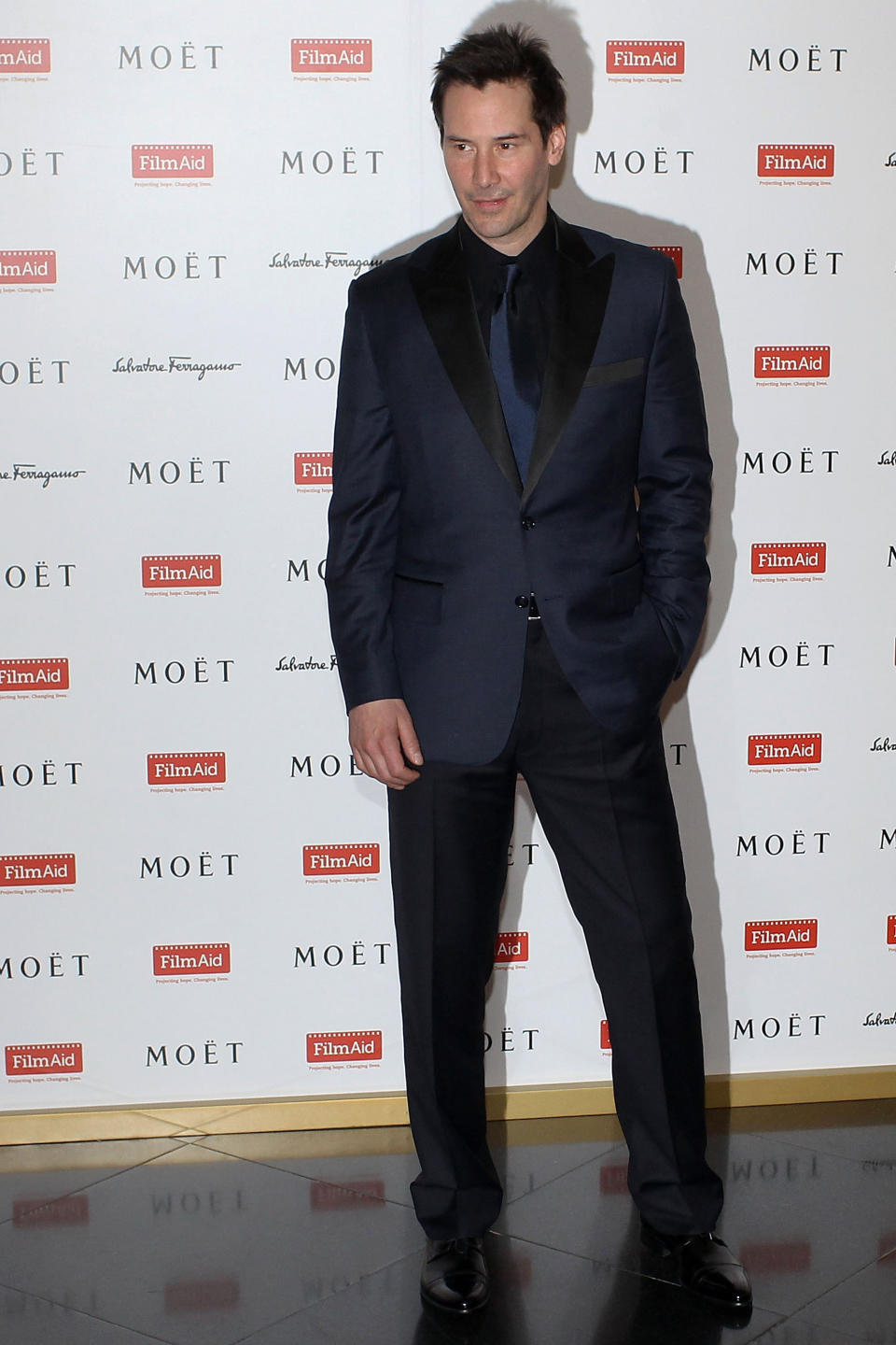  Keanu Reeves poses on the red carpet at the Power of Film Gala at the Grand Hyatt Hong Kong's Grand Ballroom on March 18, 2012 in Hong Kong, Hong Kong. 