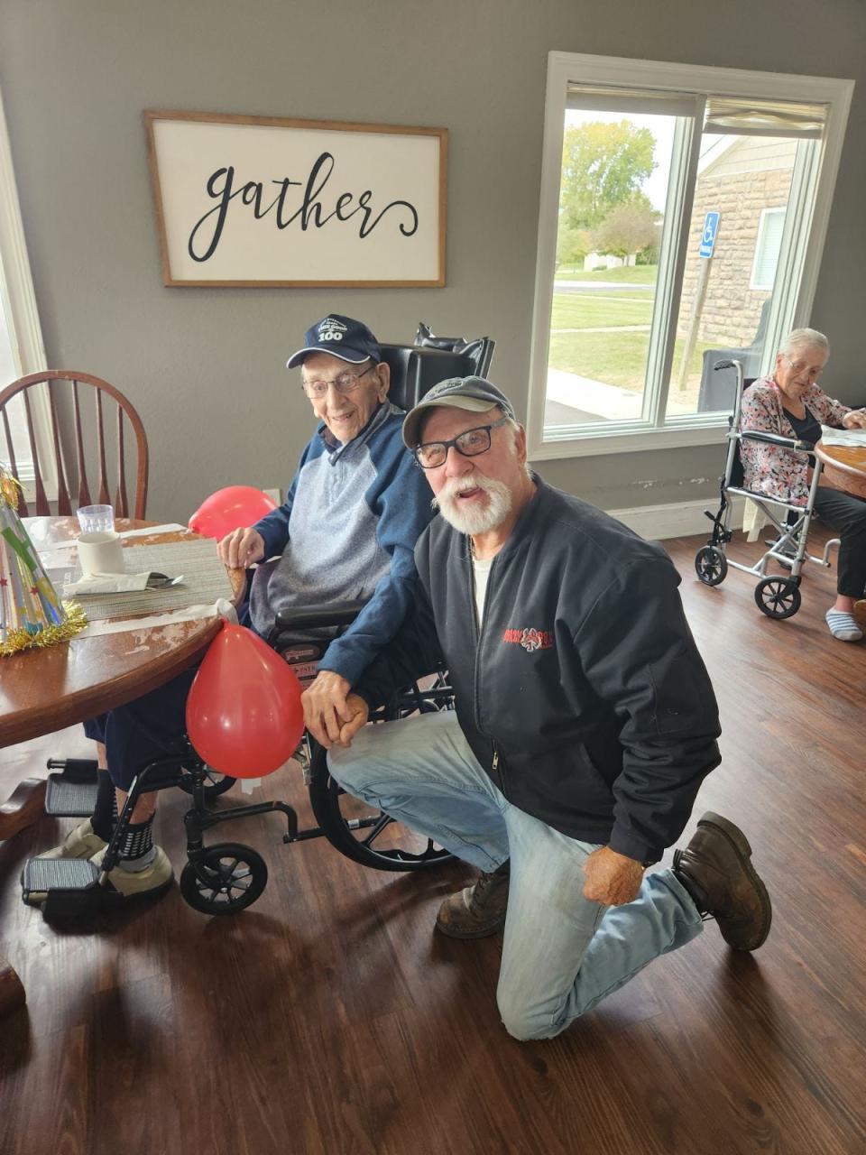 Larry Williams (front) with his friend and former business partner Elmer Kafer, who now resides at at Orchard Park in Bucyrus. Williams owns 98 Lounge along with Dave Wenner and J.R. Wenner.