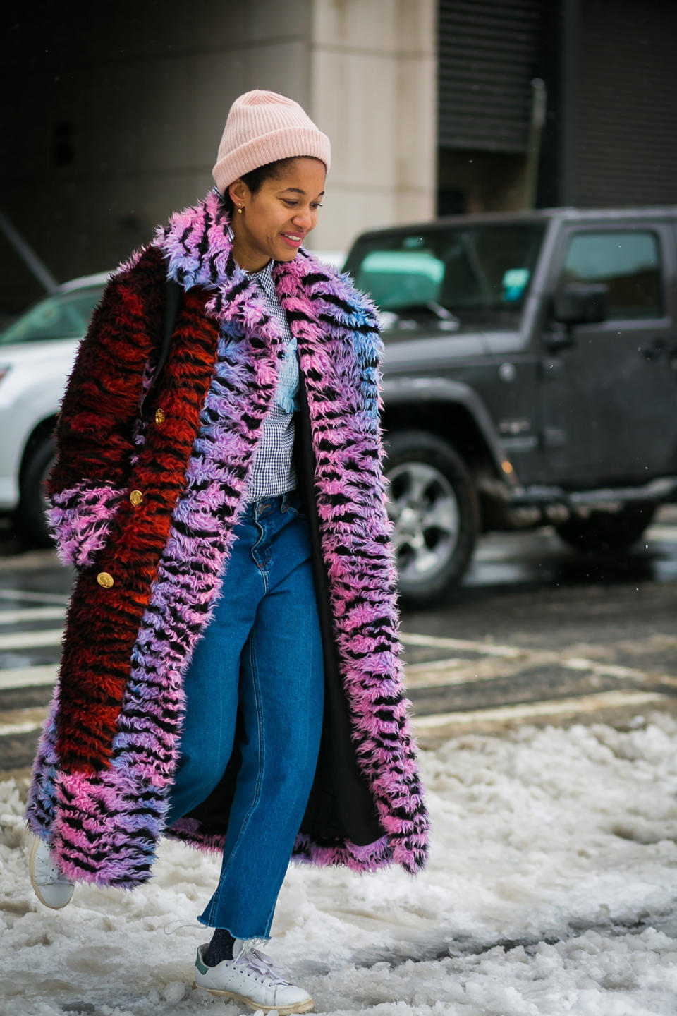 Tamu McPherson wears a technicolor dream coat at New York Fashion Week.