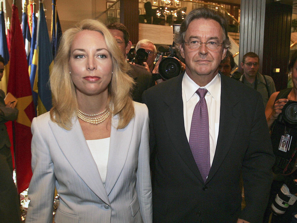 FILE - In this July 2, 2007 file photo, former CIA officer Valerie Plame, left, and her husband, former ambassador Joseph Wilson, arrive for a news conference at the National Press Club in Washington in this July 14, 2006, file photo. Wilson, the diplomat who disputed pre-war intelligence on Iraq and endured retribution, has died. He was 69. Valerie Plame confirmed in a text message that Wilson died Friday, Sept. 27, 2019, of organ failure in Santa Fe, N.M. She called him a patriot with the heart of a lion. Wilson's denial of pre-war intelligence under the administration of President George W. Bush touched off retribution against Plame and a criminal cover-up. (AP Photo/Lawrence Jackson, File)