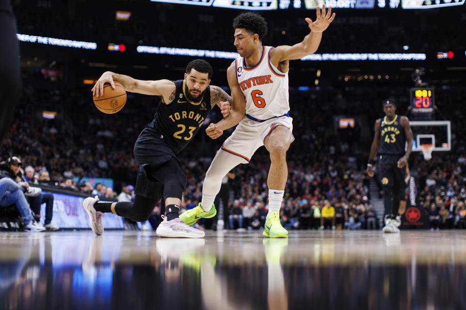 Toronto Raptors guard Fred VanVleet (23) drives against New York Knicks guard Quentin Grimes (6) during the first half of an NBA basketball game Friday, Jan. 6, 2023, in Toronto. (Cole Burston/The Canadian Press via AP)