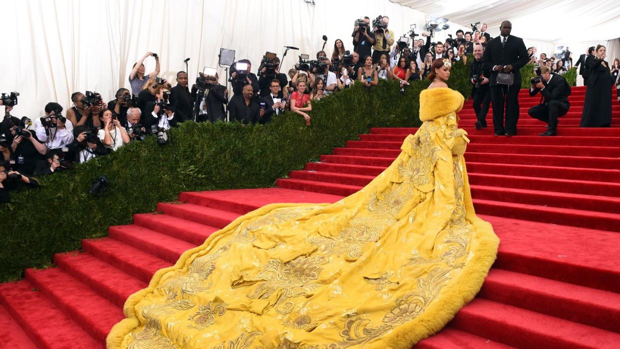 rihanna arrives at the 2015 metropolitan museum of arts costume institute gala benefit in honor of the museums latest exhibit china through the looking glass may 4, 2015 in new york afp photo timothy a clary photo credit should read timothy a claryafp via getty images