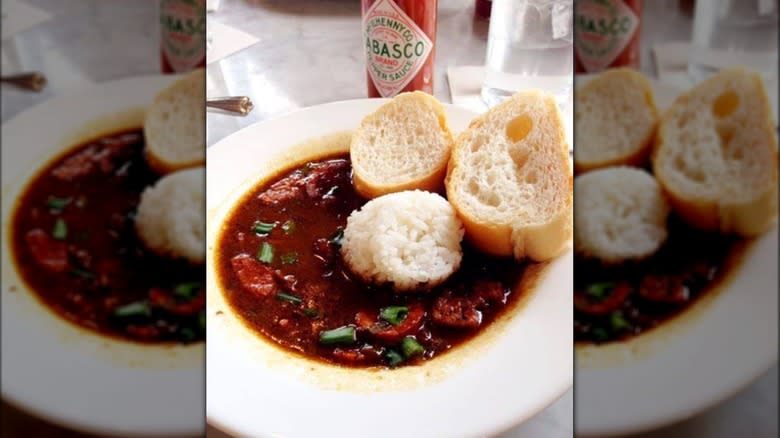 gumbo bowl with bread Tabasco