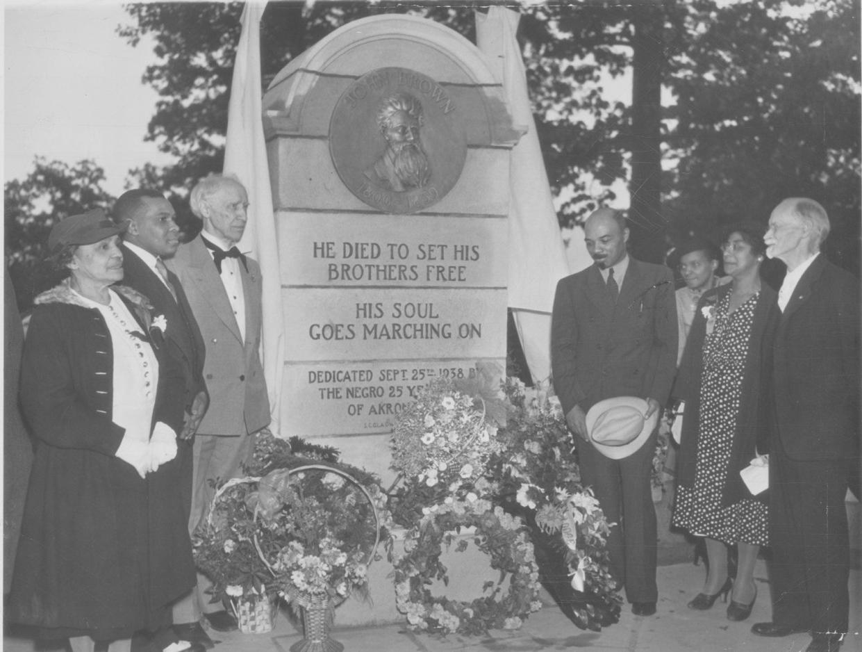 Attending a 1938 dedication ceremony for the restored John Brown Monument are, from left, Julia E. Clark, E.M. Lancaster, U.S. Sen. Charles Dick, Dr. Gilbert H. Jones, Cora P. Christian, Ethel Ashby and S.C. Gladwin.