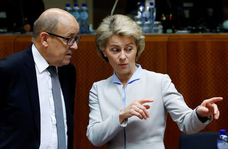 France's Defence Minister Jean-Yves Le Drian (L) and his German counterpart Ursula von der Leyen attend a European Union foreign and defence ministers meeting in Brussels, Belgium November 14, 2016. REUTERS/Yves Herman