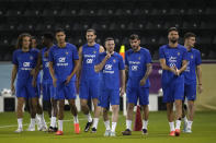 French soccer team players arrive for a training session at the Jassim Bin Hamad stadium in Doha, Qatar, Thursday, Nov. 24, 2022. France will play in the World Cup against Denmark on Nov. 26. (AP Photo/Christophe Ena)