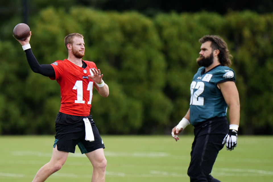 Philadelphia Eagles' Carson Wentz, left, participates in a drill with Jason Kelce during practice at the NFL football team's facility, Thursday, Sept. 10, 2020, in Philadelphia. (AP Photo/Matt Slocum)