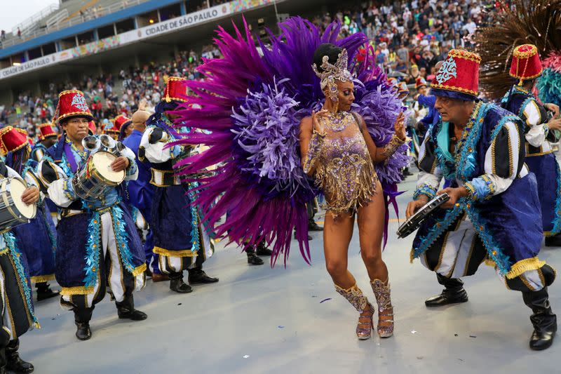 Revellers from Imperio de Casa Verde samba school perform during the first night of the Carnival parade at the Sambadrome in Sao Paulo