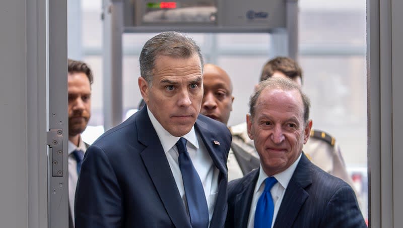 Hunter Biden, left, son of President Joe Biden, arrives with attorney Abbe Lowell at the O'Neill House Office Building for a closed-door deposition in a Republican-led investigation into the Biden family, on Capitol Hill in Washington, Wednesday, Feb. 28, 2024. Lawmakers from the House Oversight and Accountability Committee and the House Judiciary Committee are conducting the inquiry.