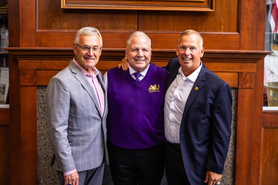 Former Ohio State coach Jim Tressel with Ashland University Gridiron Club president Don Graham (center) and former AU coach Lee Owens.