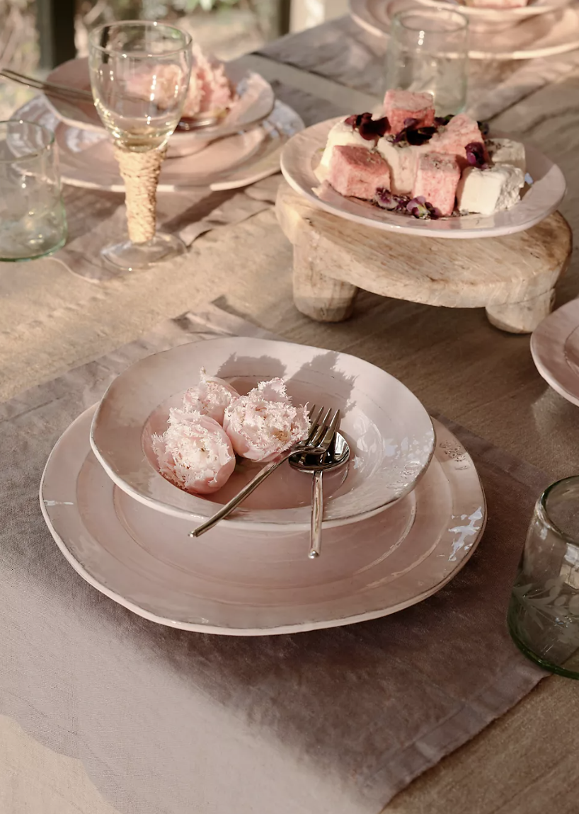 pink tablescape with light pink Glenna Pasta Bowls, Set of 4 (photo via Anthropologie)