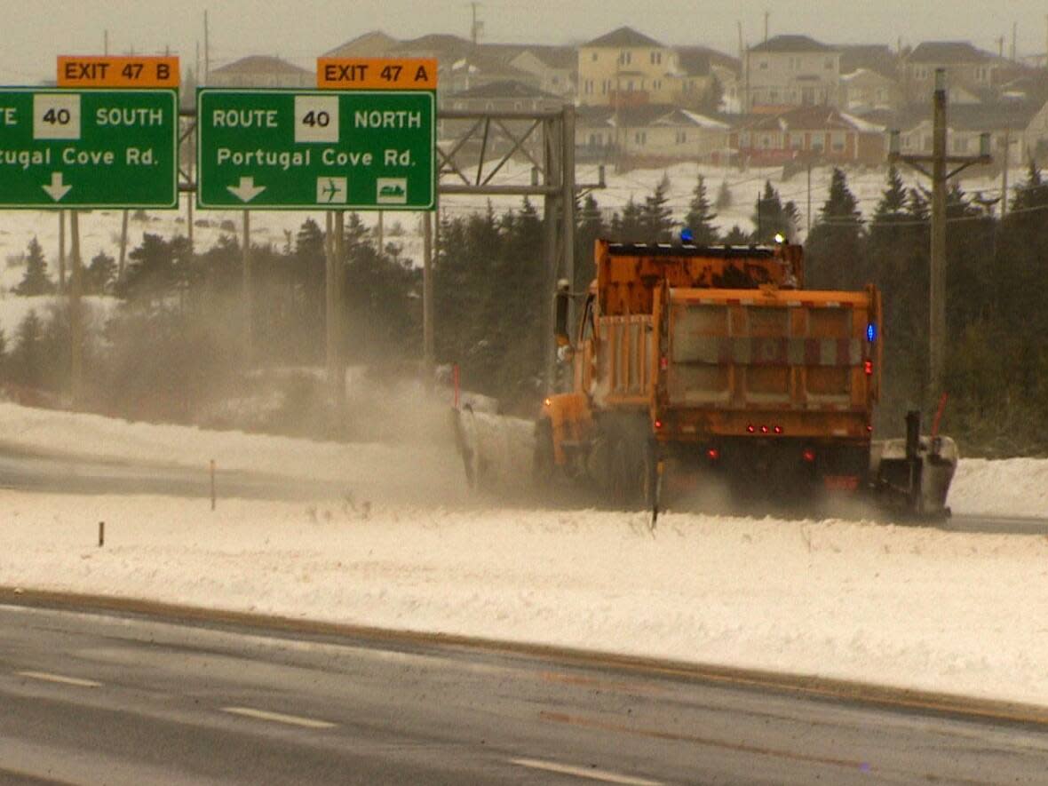 Snow-clearing crews are busy at work in eastern Newfoundland on Wednesday.  (Garrett Barry/CBC - image credit)