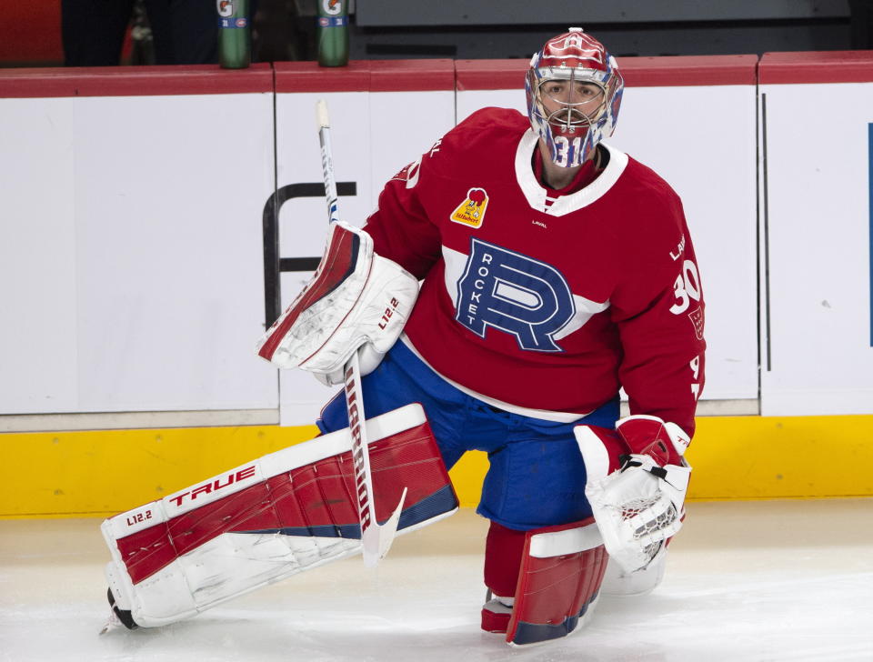 Montreal Canadiens goaltender Carey Price warms up before the Laval Rocket against the Toronto Marlies American Hockey League game in Montreal, Monday, May 17, 2021. Price and teammate Brendan Gallagher are on a one-game conditioning loan to the Rocket before their playoff series against the Toronto Maple Leafs. (Ryan Remiorz/The Canadian Press via AP)