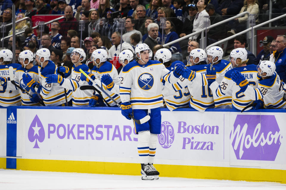 Buffalo Sabres right wing Tage Thompson (72) celebrates with teammates after scoring against the Toronto Maple Leafs during the second period of an NHL hockey game Saturday, Nov. 4, 2023, in Toronto. (Christopher Katsarov/The Canadian Press via AP)