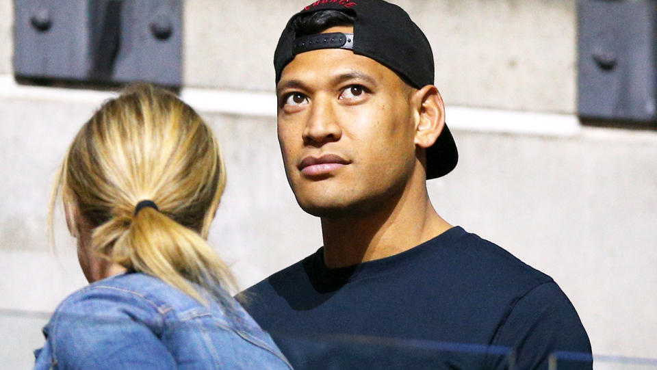 Israel Folau, pictured here in the stands during the Netball World Cup.