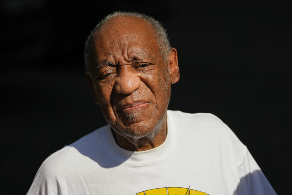 File-This June 30, 2021, file photo shows Bill Cosby reacting outside his home in Elkins Park, Pa., after being released from prison. The lead prosecutor in Cosby's sex assault case believes the Pennsylvania Supreme Court overstepped its power in reversing the comedian's conviction and added "fuel on the fire' when the chief judge gave a weekend television interview, and appeared to misstate the key issue in the appeal. Chief Judge Max Baer accused prosecutors of a "reprehensible bait and switch" in arresting Cosby in 2015 despite what he called the certain existence of a 2005 non-prosecution agreement. (AP Photo/Matt Slocum, File)
