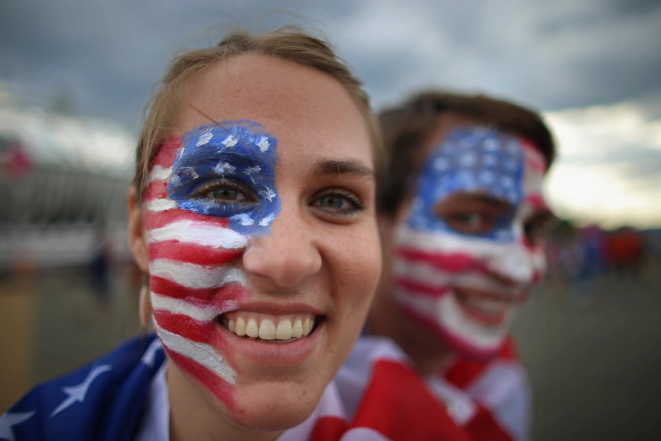 LONDON, ENGLAND - JULY 28: Anna Nolte and Matt Allbee pose with their painted faces on day one of the London 2012 Olympic Games at the Olympic Park on July 28, 2012 in London, England. (Photo by Jeff J Mitchell/Getty Images)