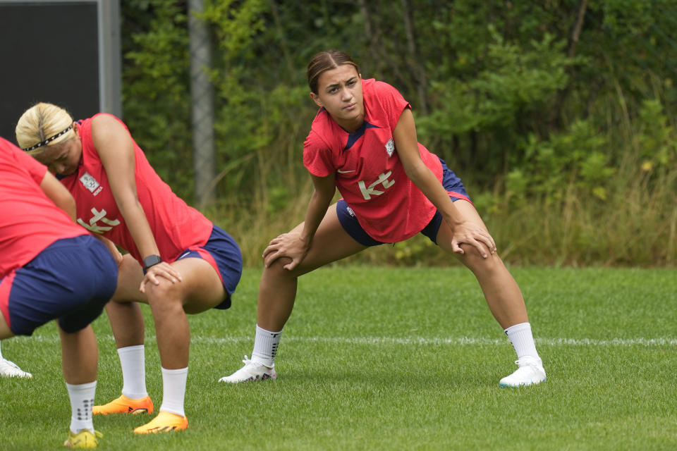 FILE - South Korea's women national soccer team player Casey Phair warms up during a training session ahead of the FIFA Women's World Cup at the National Football Center in Paju, South Korea, Friday, June 30, 2023. South Korea will compete in the Group H at the FIFA Women's World Cup with Germany, Morocco and Colombia. (AP Photo/Lee Jin-man, File)