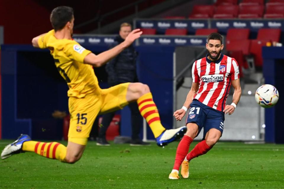 Yannick Carrasco scores Atlético’s winner from long range despite Clément Lenglet’s despairing lunge.