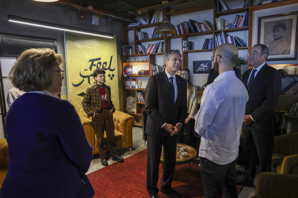 US Secretary of State Antony Blinken, center, and US ambassador to Israel Thomas Nides, right, meet with Israeli emerging leaders at "Feel Beit", an Israeli-Palestinian art and culture collective in Jerusalem, Tuesday Jan. 31, 2023. (Ronaldo Schemidt/Pool via AP)