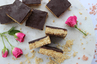 This deliciously healthy <a rel="nofollow" href="https://au.lifestyle.yahoo.com/food/recipes/r/31592992/choc-peanut-butter-slice-snack-recipe-charlie-de-haas/" data-ylk="slk:chocolate peanut butter slice;elm:context_link;itc:0;sec:content-canvas" class="link ">chocolate peanut butter slice</a> by health mentor and entrepenuer <a rel="nofollow noopener" href="http://www.thecleantreatsfactory.com" target="_blank" data-ylk="slk:Charlie De Haas;elm:context_link;itc:0;sec:content-canvas" class="link ">Charlie De Haas</a> is just the snack you need to pack into your Miu Miu hangbag for MBFW.