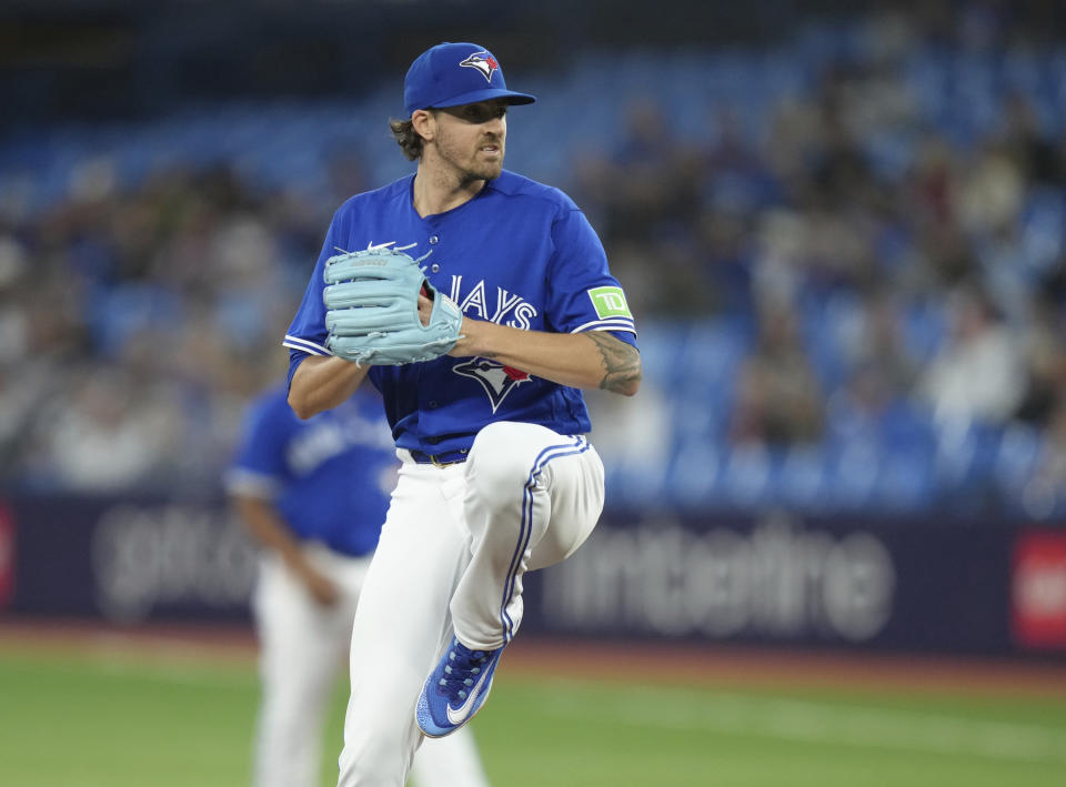 Toronto Blue Jays starting pitcher Kevin Gausman winds up during the first inning of the team's baseball game against the New York Yankees on Tuesday, Sept. 26, 2023, in Toronto. (Chris Young/The Canadian Press via AP)