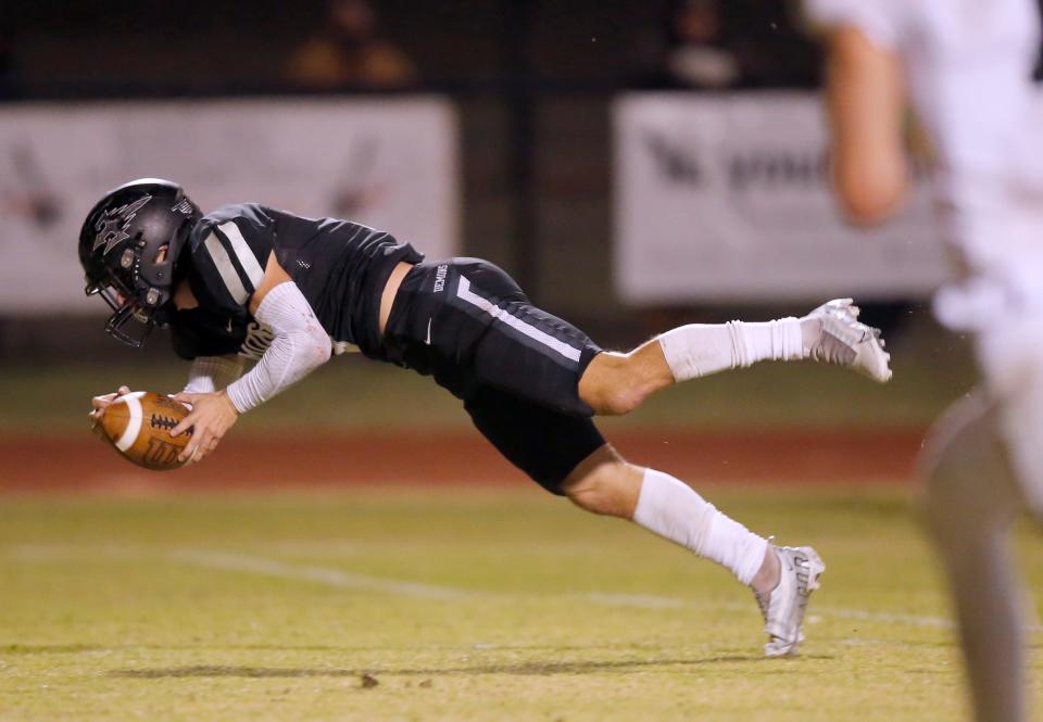 Perkins-Tryon's Braiton Applegate dives for a touchdown against Marlow on Nov. 11, 2022, in Perkins.