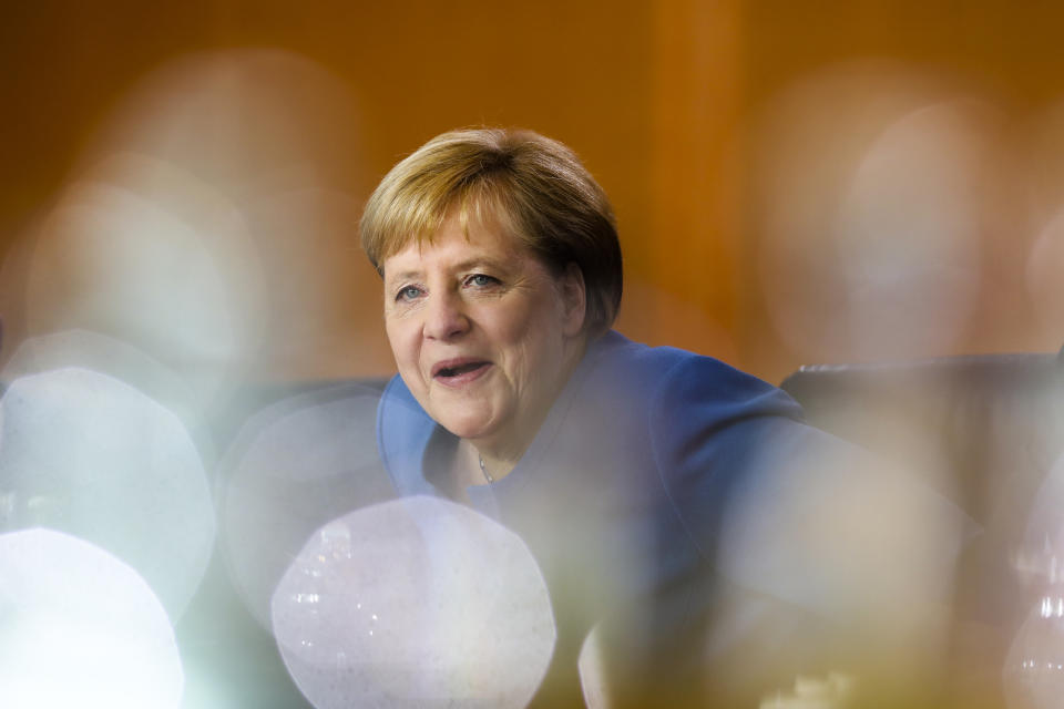 German Chancellor Angela Merkel arrives for a meeting of the called Climate Cabinet at the chancellery in Berlin, Germany, Friday, Sept. 20, 2019. The Climate Cabinet in a committee of German government ministers and advisors to develop strategies for Germany to fight the climate change. (AP Photo/Markus Schreiber)