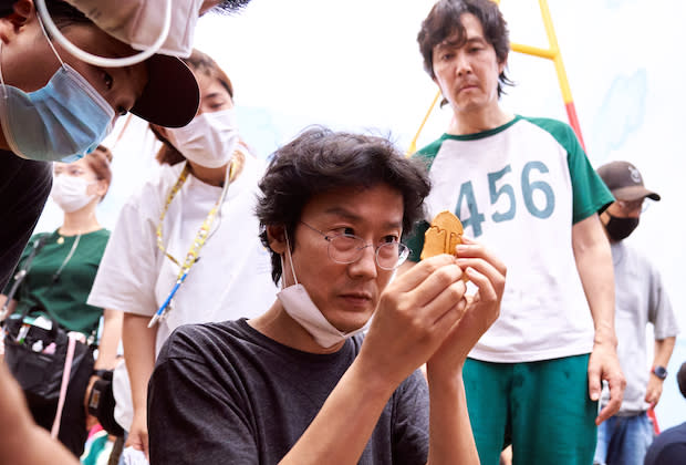 Hwang (center) on-set for ‘Squid Game’ - Credit: Hwang Dong-hyuk on set (Courtesy of Netflix)