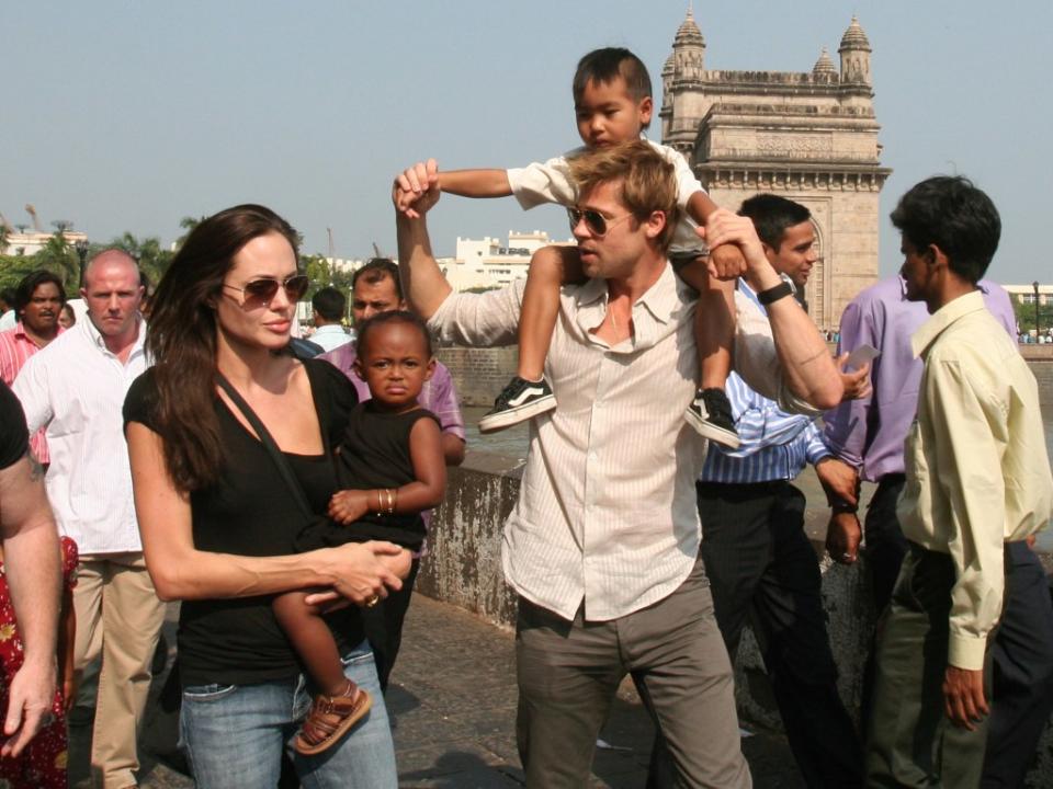 Angelina Jolie with daughter Zahara, Brad Pitt and son Maddox. AP