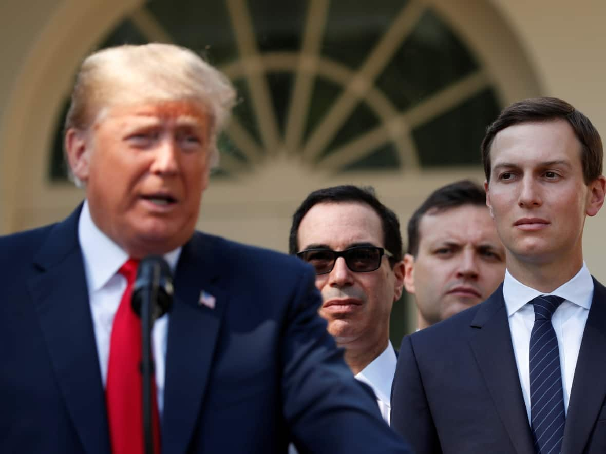 Kushner, right, as his father-in-law announces a new NAFTA deal on Oct. 1, 2018. It was a rocky ride getting there. (Kevin Lamarque/Reuters - image credit)