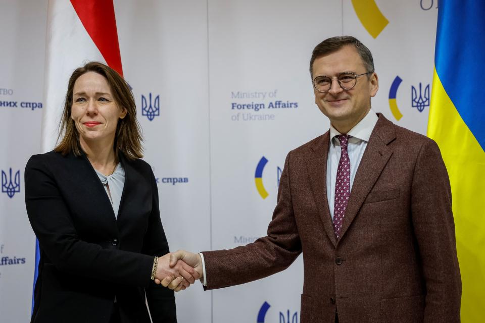 Dutch Foreign Minister Bruins Slot and her Ukrainian counterpart Kuleba shake hands before a joint press conference in Kyiv (REUTERS)