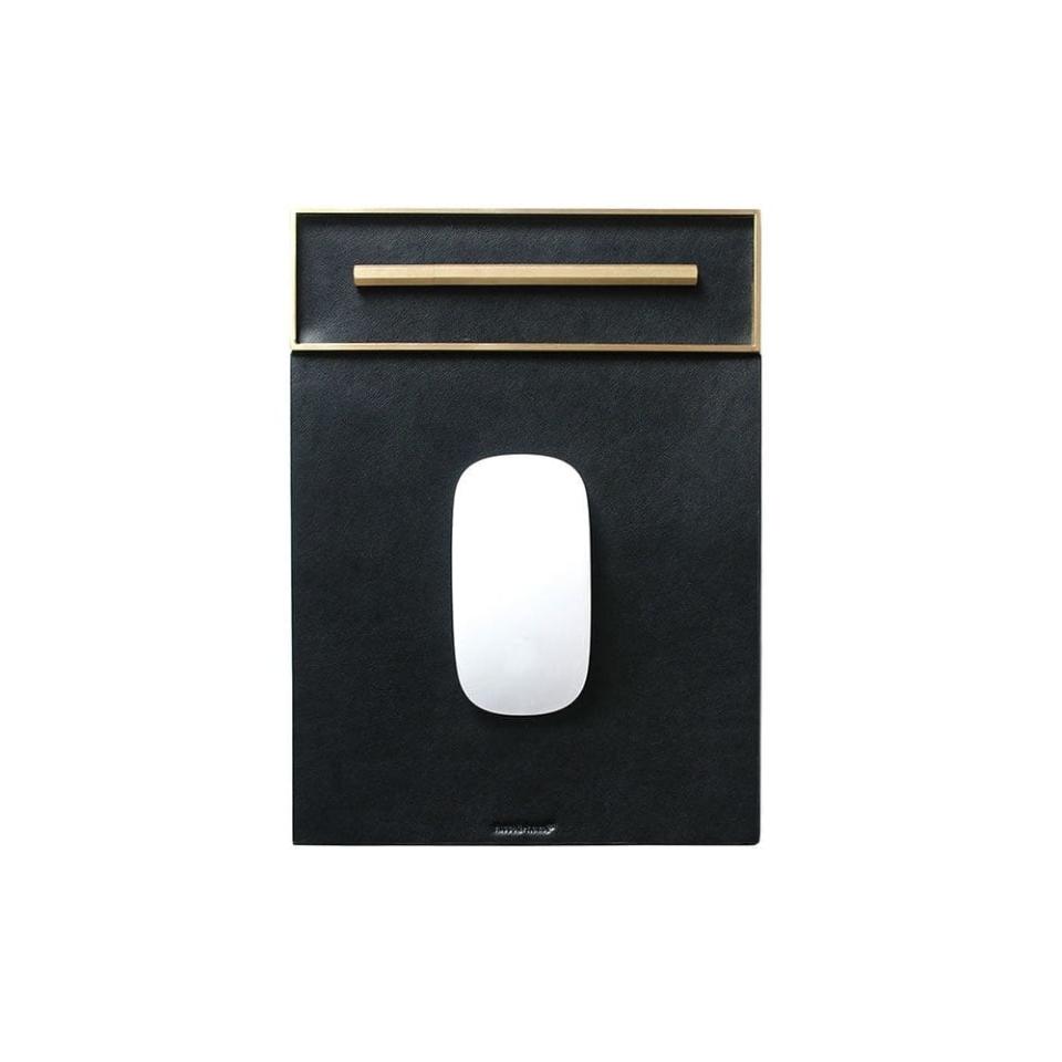 <p><a href="https://www.russellandhazel.com/products/mousepad-vegan-leather-black" rel="nofollow noopener" target="_blank" data-ylk="slk:Shop Now;elm:context_link;itc:0;sec:content-canvas" class="link ">Shop Now</a></p><p>Mousepad</p><p>russellandhazel.com</p><p>$50.00</p>