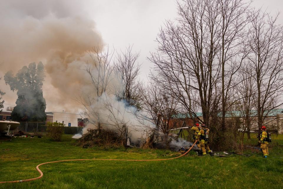 Firefighters extinguish a fully involved RV fire in the 200 block of North Forney Avenue, Monday, April 1, 2024, in Hanover . No one was reported injured in the fire, which is under investigation.