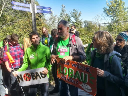 Austrian environmentalist candidate Lukas Hammer (2nd L) has dismissed the idea of a highway under a national park as a 'solution of the past'