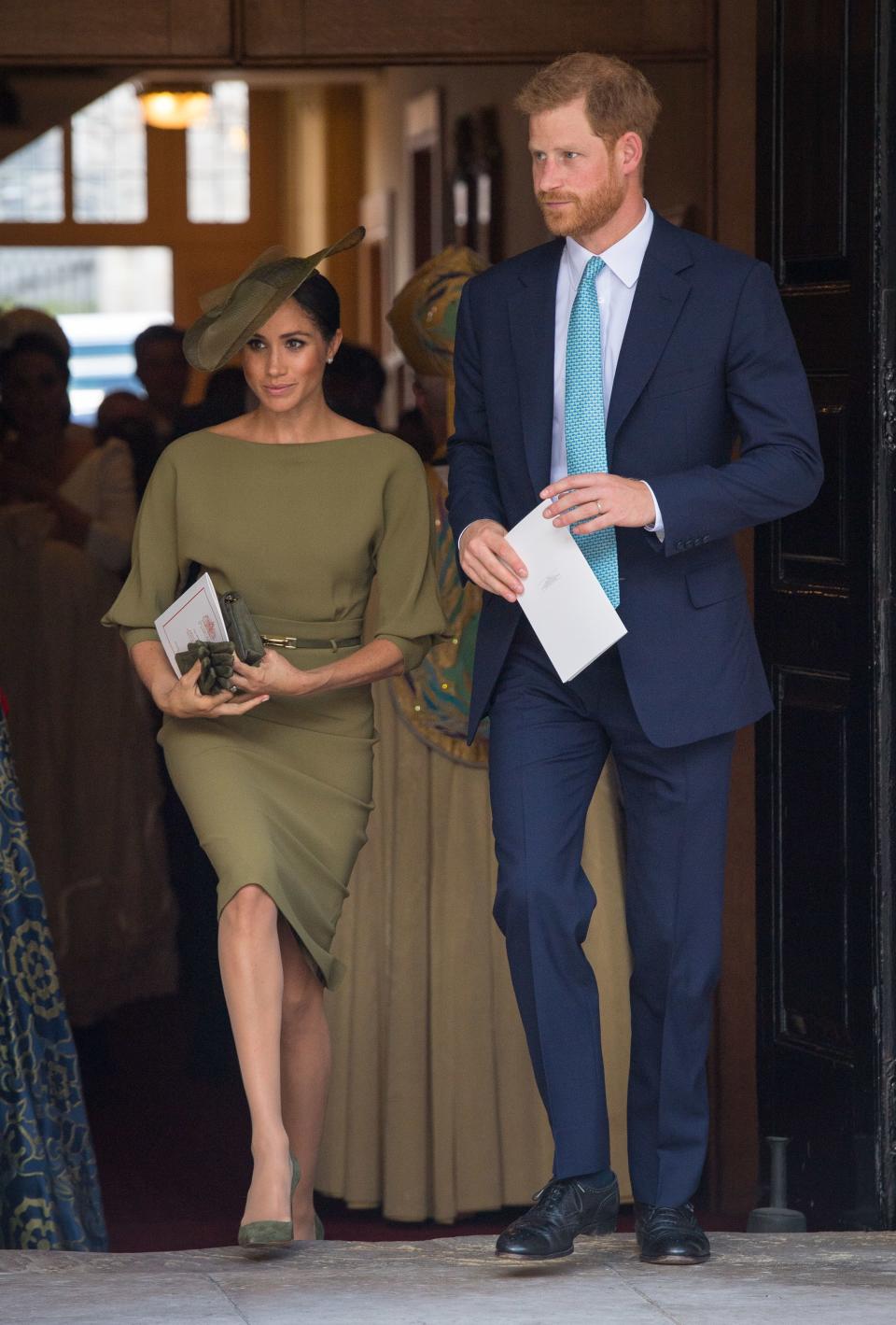 On 10 July, the Duchess of Sussex chose an olive-hued dress by Ralph Lauren for Prince Louis of Cambridge’s christening [Photo: Getty]