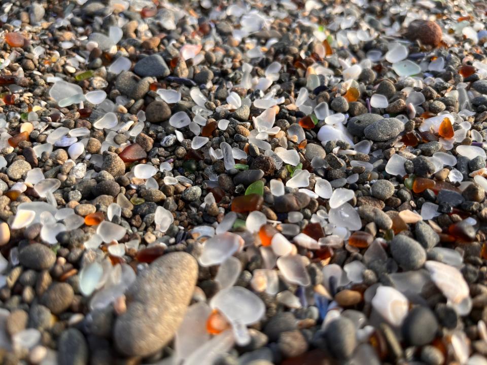 Glass Pebbles by the sea by Jessica Ritchie for the 2023 Times Photo Contest. 
