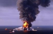 Fire boats battle the blazing remnants of the BP-operated off-shore oil rig Deepwater Horizon, in the Gulf of Mexico in 2010. BP has agreed to pay a record $4.5 billion in US fines for the 2010 Gulf of Mexico oil spill and pled guilty to 14 counts including felony manslaughter in the deaths of 11 workers