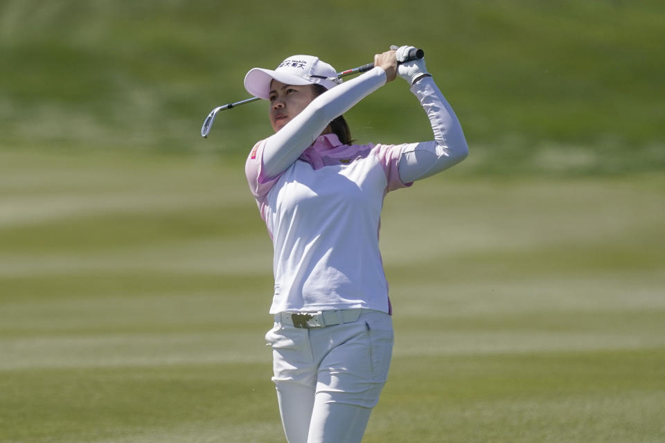 Wei-Ling Hsu watches her fairway shot on the ninth hole during the final round of the Drive On Championship golf tournament, Sunday, March 26, 2023, in Gold Canyon, Ariz. (AP Photo/Darryl Webb)