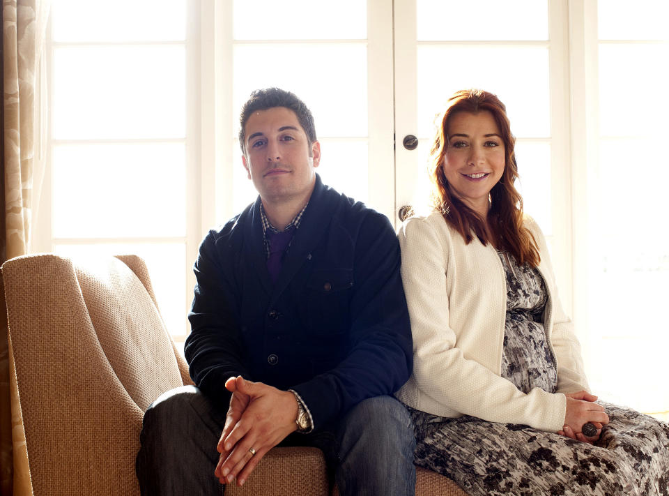 In this March 18, 2012 photo, actors Jason Biggs, left, and Alyson Hannigan pose for a portrait during a media day for the upcoming feature film "American Reunion" in Los Angeles. The film opens nationwide on Friday, April 6. (AP Photo/Dan Steinberg)