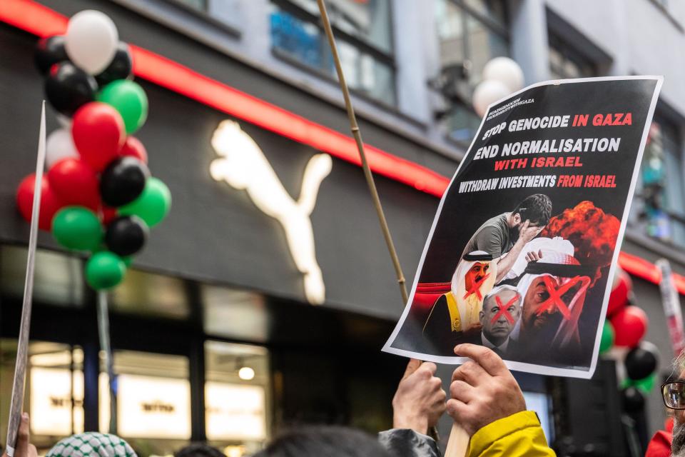 London / UK  23 DEC 2023. Hundreds of people demonstrated in Carnaby street in London, calling for an immediate ceasefire in Gaza and a boycott of “Israel-linked” brands. Aubrey Fagon / Alamy Live News