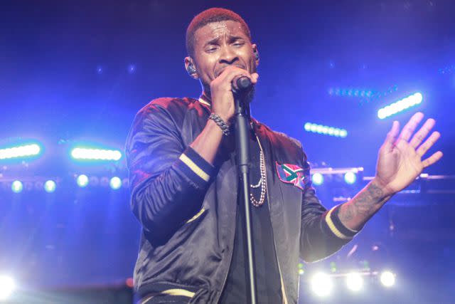 <p>Thaddaeus McAdams/FilmMagic</p> Usher performing in Los Angeles in June 2016