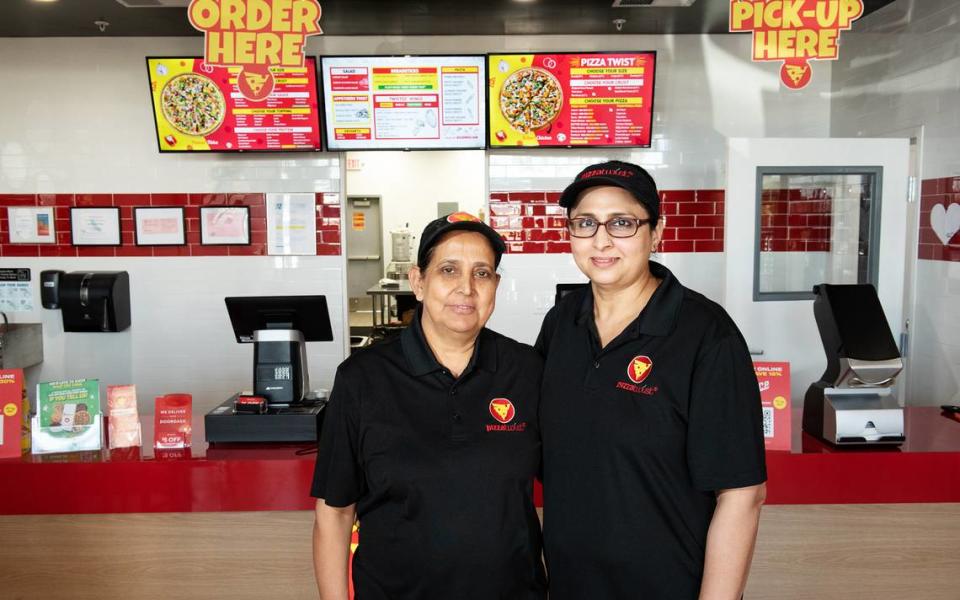 Owners Swaranjeet Sekhon, left, and Jasbir Kaur at Pizza Twist in Modesto, Calif., Thursday, April 6, 2023.